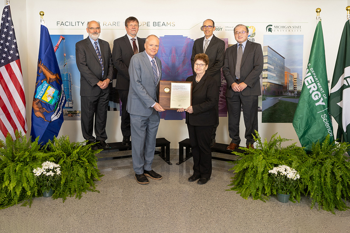 Dr. Linda L. Horton (front right), U.S. Department of Energy Office of Science (DOE-SC) Associate Deputy Director for Science Programs and acting Associate Director of the DOE-SC Office of Nuclear Physics (DOE-SC NP), presented a DOE Secretary of Energy Achievement Award to the Facility for Rare Isotope Beams (FRIB) Project team.