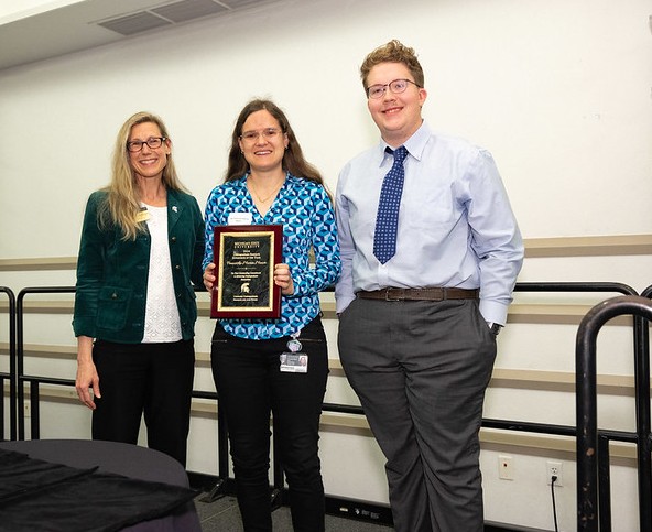 Franziska Maier (middle) stands with Laura Lee McIntyre (left) and Austin Sjaarda (right)
