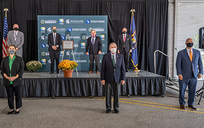 U.S. Secretary of Energy Dan Brouillette (back row, third from left) designated the Facility for Rare Isotope Beams as a U.S. Department of Energy (DOE) Office of Science user facility 29 September. Pictured above at the event are: (Front row, left to right) U.S. Representative Elissa Slotkin of Michigan, U.S. Representative Tim Walberg of Michigan, U.S. Representative John Moolenaar of Michigan; (back row, left to right) FRIB Laboratory Director Thomas Glasmacher, MSU President Samuel L. Stanley Jr., M.D., Secretary Brouillette, and DOE Under Secretary for Science Paul Dabbar.