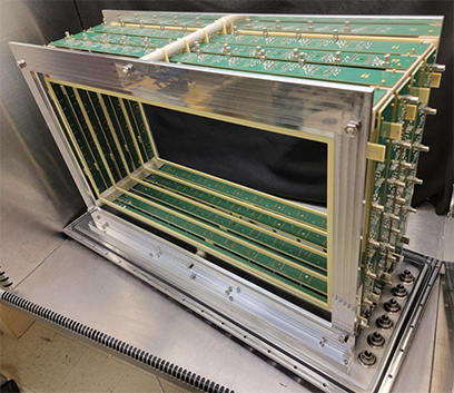 Photo of the Energy Loss Optical Scintillation System optical readout assembly (with no photomultiplier tubes) including mechanical supports. 