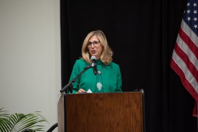 Michigan State University (MSU) Interim President Teresa K. Woodruff speaks during the agreement signing to establish the International Research Laboratory on Nuclear Physics and Astrophysics (IRL NPA) during a ceremony at the Facility for Rare Isotope Beams (FRIB) at MSU. 