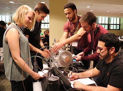 Students in the 2018 U.S. Particle Accelerator School (USPAS) being held at Michigan State University work together on a project. One-hundred thirty-three students from around the world are attending the intensive two-week session at MSU. Photo credit: Irina Novitski, USPAS