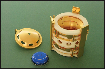 Shown are the gold-plated high-precision electrodes that provide the electric fields needed for capturing and storing rare isotope ions in the 9.4 T field of the LEBIT Penning trap mass spectrometer.