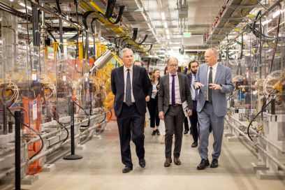 From left, Ambassador of France to the United States Laurent Bili, Consul General of France in Chicago Yannick Tagand, FRIB Laboratory Director Thomas Glasmacher tour the Facility for Rare Isotope Beams.