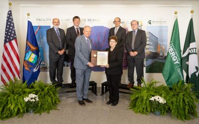 Dr. Linda L. Horton (front right), U.S. Department of Energy Office of Science (DOE-SC) Associate Deputy Director for Science Programs and acting Associate Director of the DOE-SC Office of Nuclear Physics (DOE-SC NP), presented a DOE Secretary of Energy Achievement Award to the Facility for Rare Isotope Beams (FRIB) Project team.