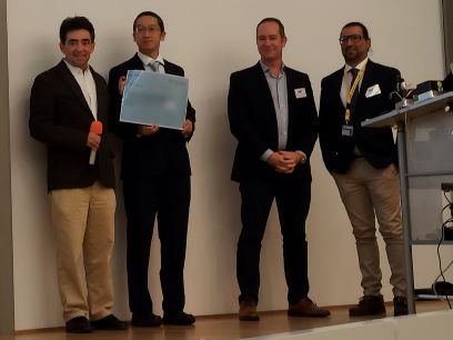 A picture of Junwei Guo, ion source scientist at FRIB, (second from left) with Benoit Geller, son of Richard Geller (far left), Mathieu Cavellier of Pantechnik (second from right), and Fabio Maimone, chair of ECRIS 2024 (far right). 